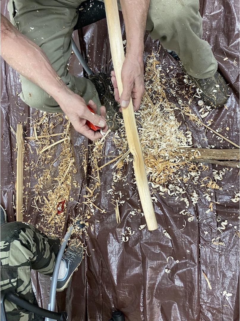 Image of Making bawa'iganaak (a wild rice knocker) from white cedar.